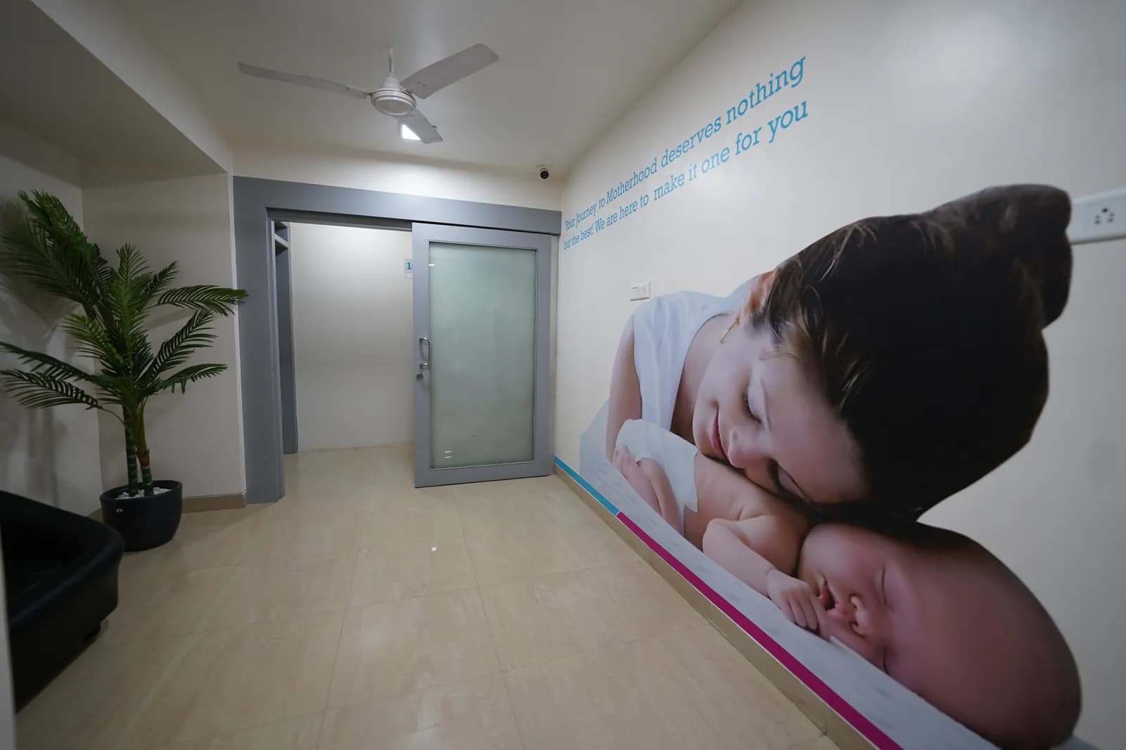 Corridor with a mother-and-baby wall mural