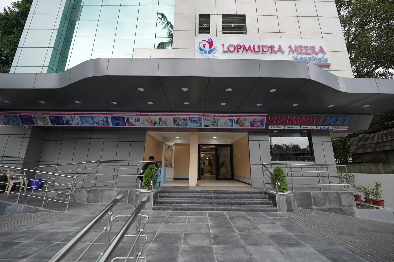 Main entrance of Lopmudra Meera Hospitals with ramp and steps